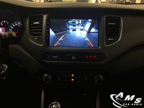 Instalación pantalla 9" con cámara de visión trasera en Kia Carens